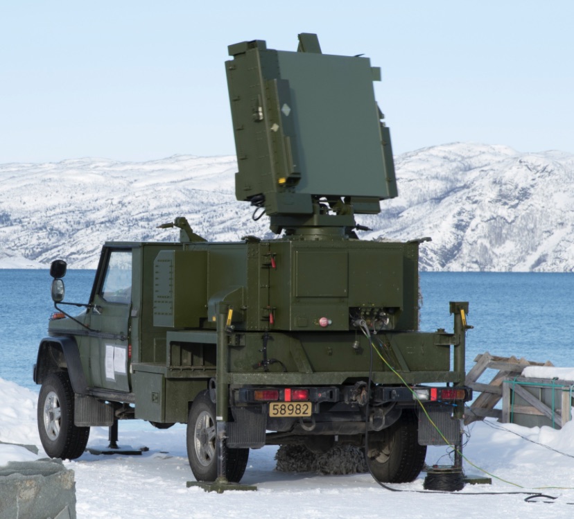 Mobile radar system on a truck in a winter coastal landscape