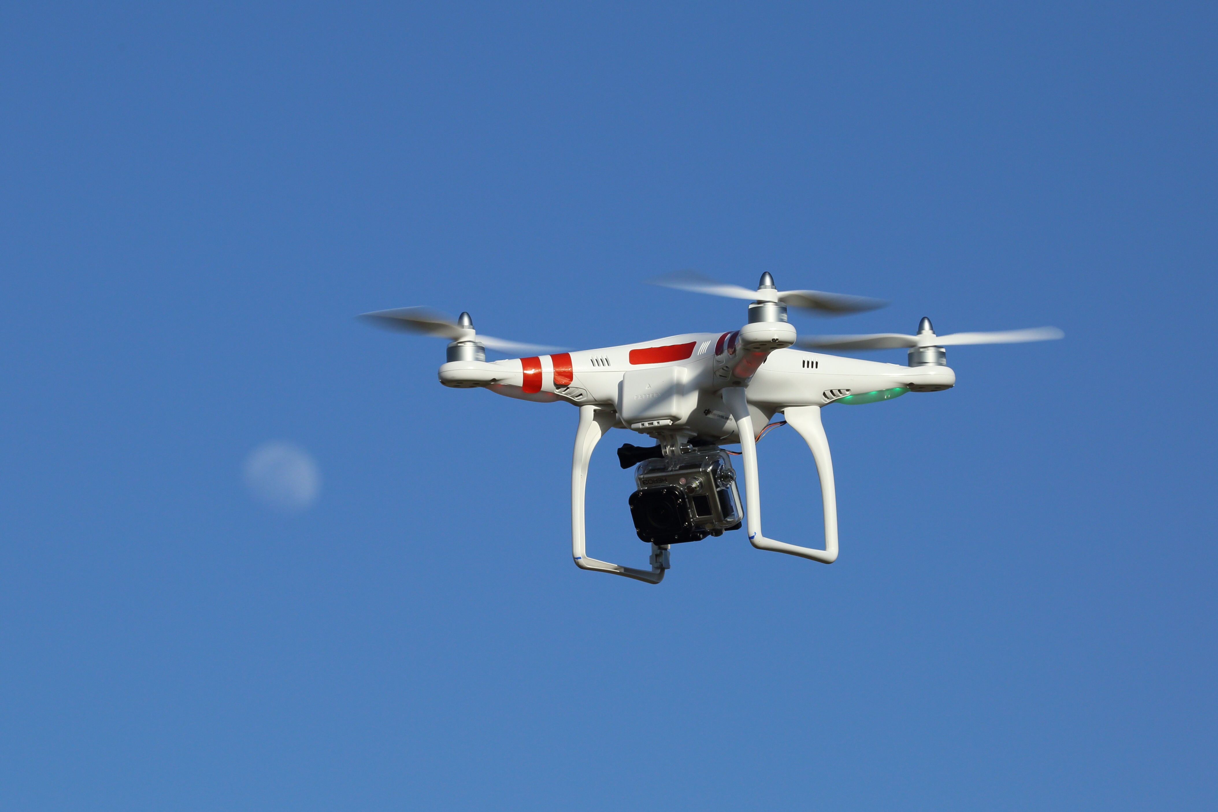 Commercial quadcopter drone in flight