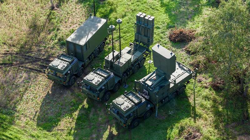 Aerial view of a SAMP/T air defense battery deployed in a field